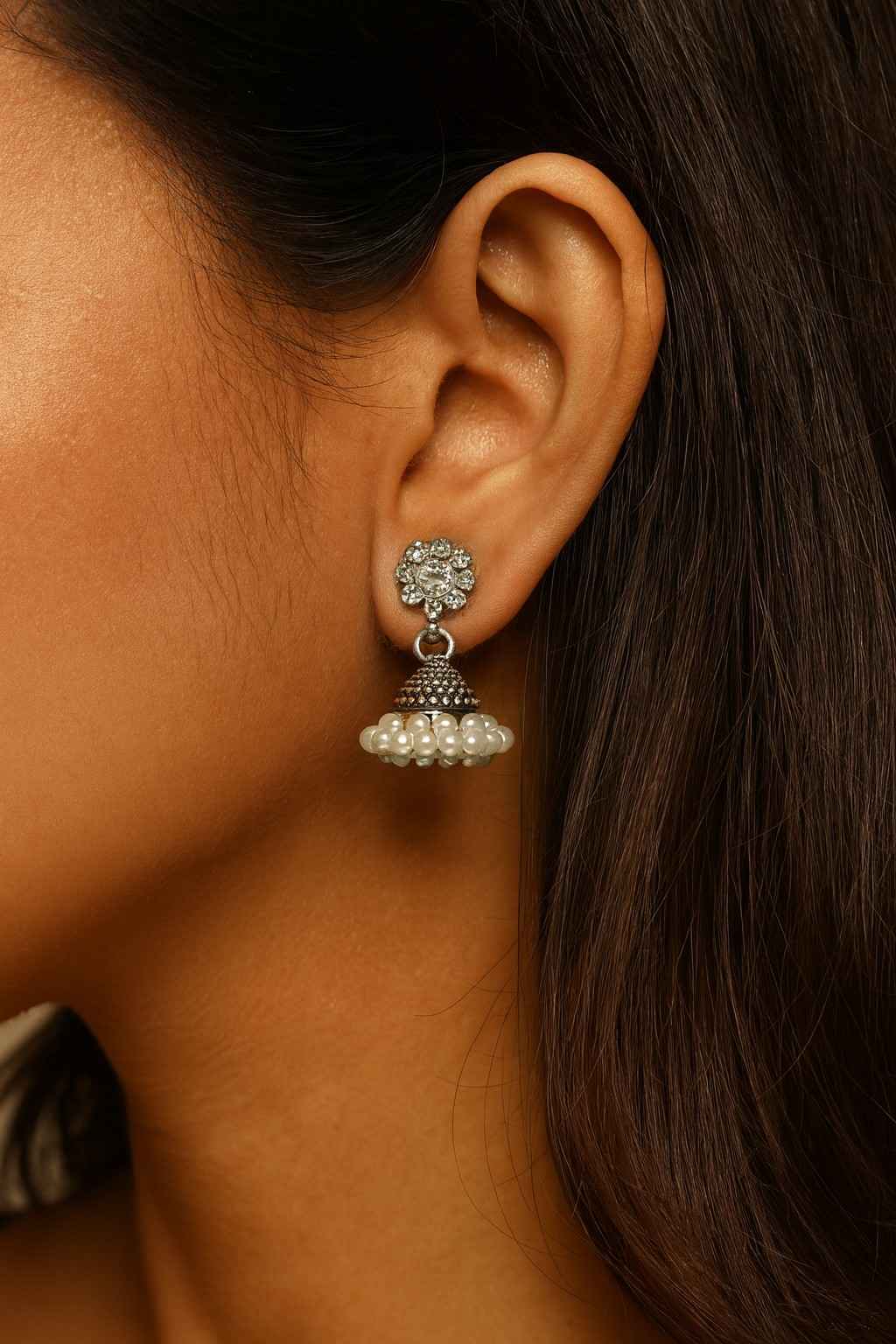 Antique silver floral stud pearl cluster jhumka earrings worn by model