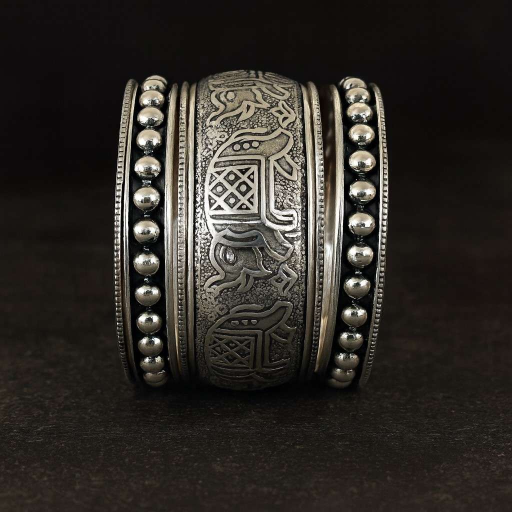 Antique elephant engraved oxidized silver-tone kada bracelet with tribal motifs – front view