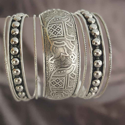 Wide oxidized silver-tone elephant kada with beaded edges – side view