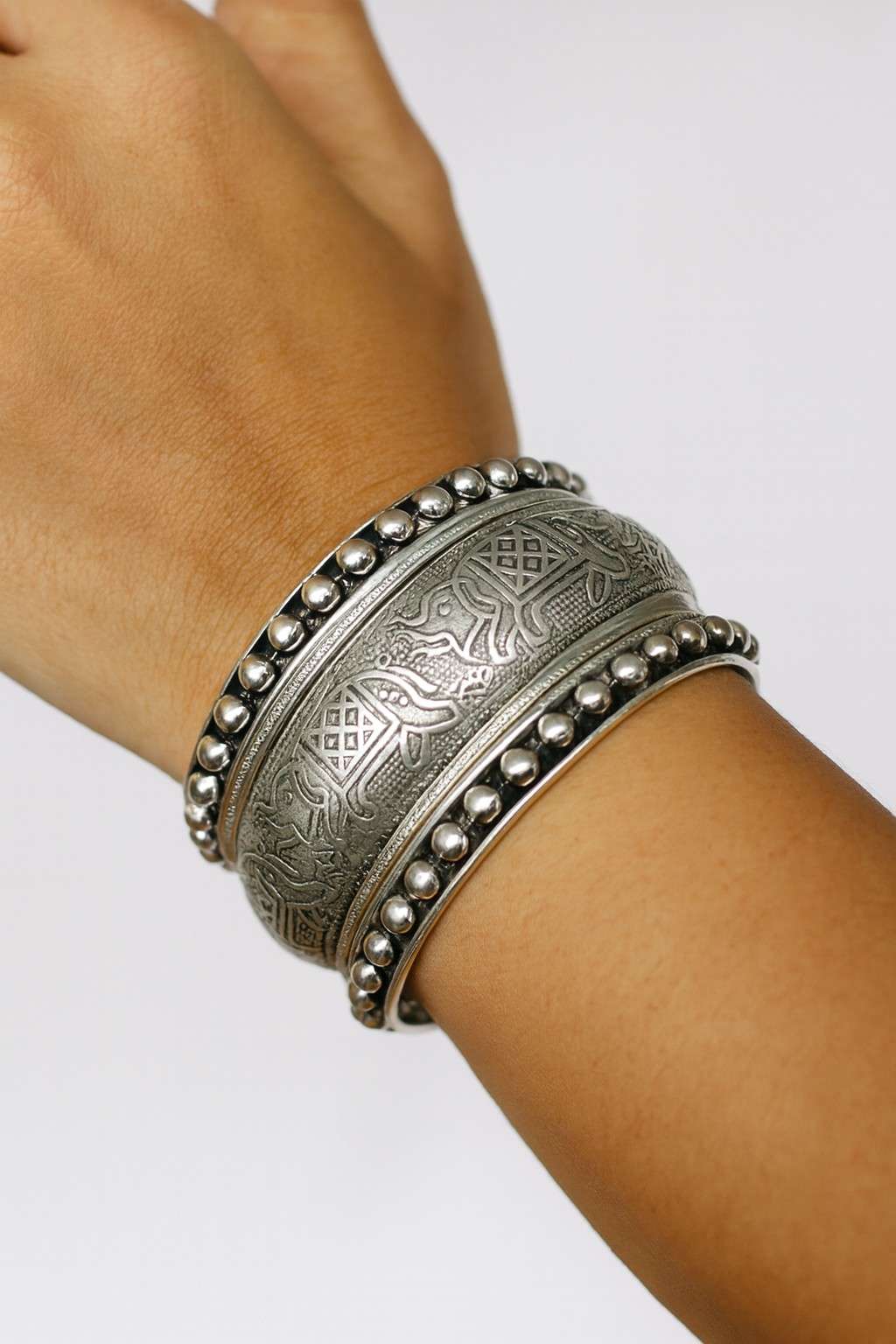 Wide oxidized silver-tone elephant kada with beaded edges – side view