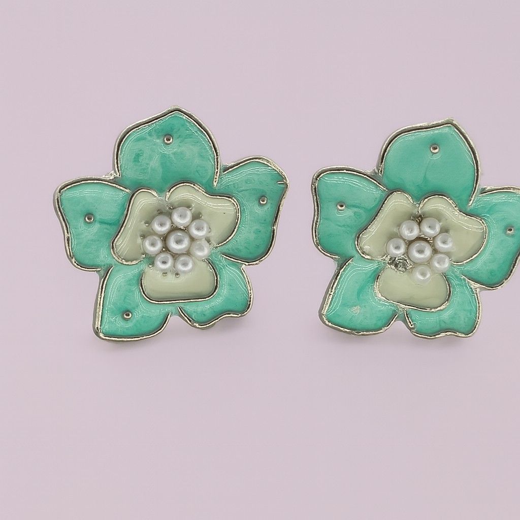 Mint green floral stud earrings with pearl detailingMint green floral stud earrings with pearl detailing