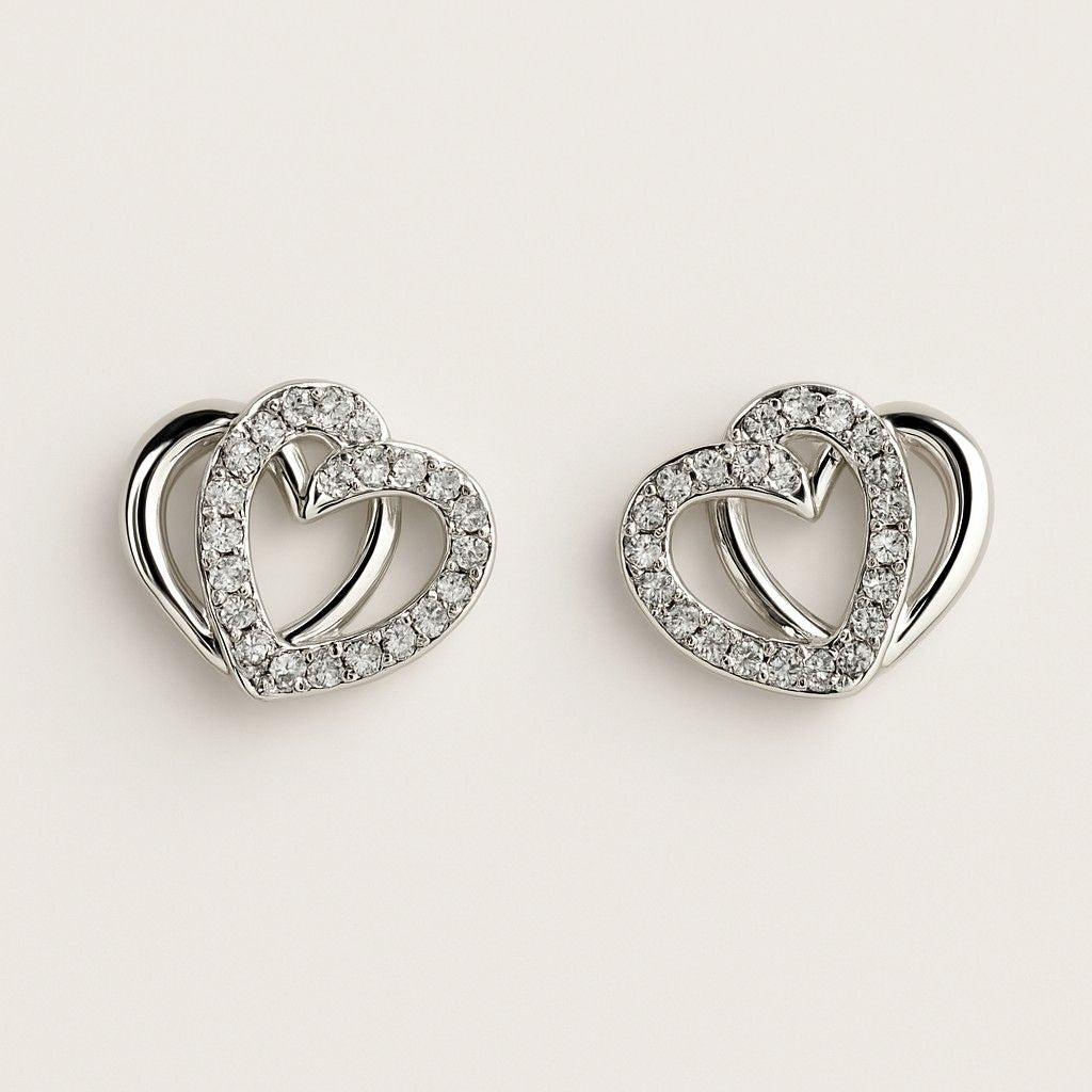 Silver-tone double heart stud earrings with crystal accents