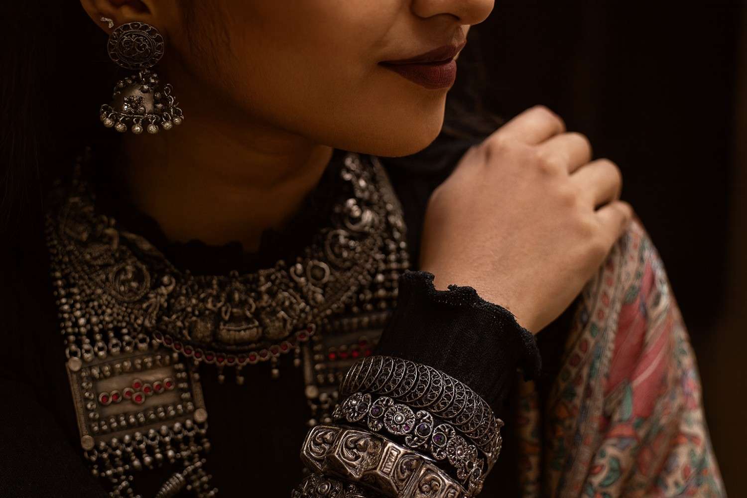 Oxidised jewellery collection featuring antique silver finish necklaces, jhumkas, bangles, and statement rings with intricate detailing.