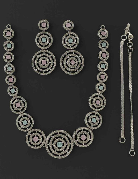 Luxury dual-tone pink and blue circular necklace set with American Diamonds in silver-tone finish, featuring matching earrings – bridal and festive wear jewelry.