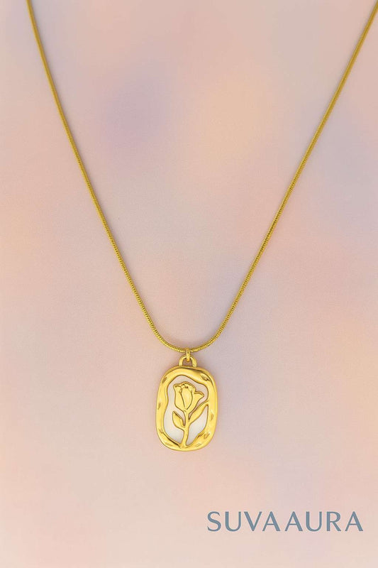 Gold necklace with embossed rose pendant in abstract frame – floral minimalist jewellery by Suvaaura

