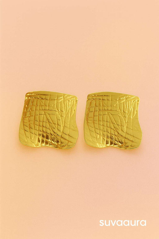 Textured gold stud earrings with abstract shape and croc-skin design – modern designer jewellery by Suvaaura

