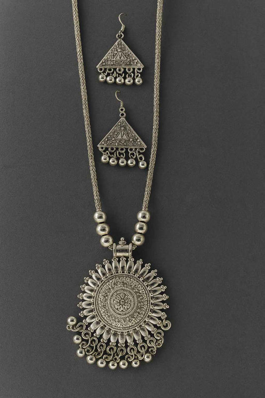 Oxidized silver-tone sunburst pendant necklace with triangle jhumka earrings – ethnic jewellery set by Suvaaura