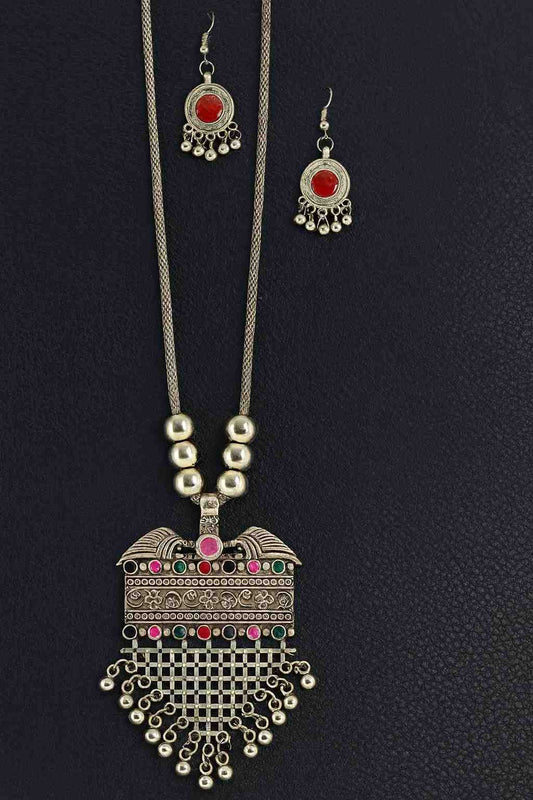 "Vintage silver-tone statement necklace with colorful stones and matching red stone drop earrings – ethnic bohemian jewelry set"