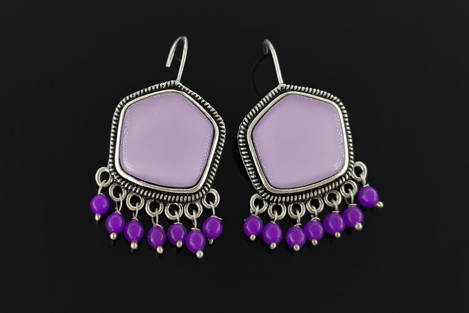 "Lavender beaded oxidized dangler earrings with purple drops"
