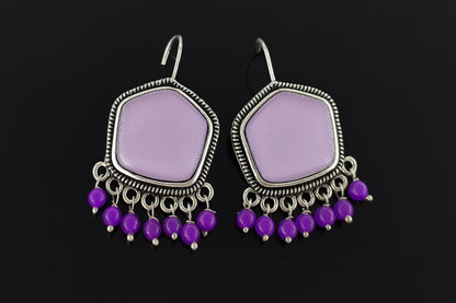 "Lavender beaded oxidized dangler earrings with purple drops"