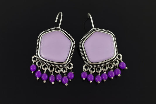 "Lavender beaded oxidized dangler earrings with purple drops"