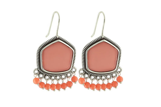 Coral pink dangle earrings with silver-tone frame and beads