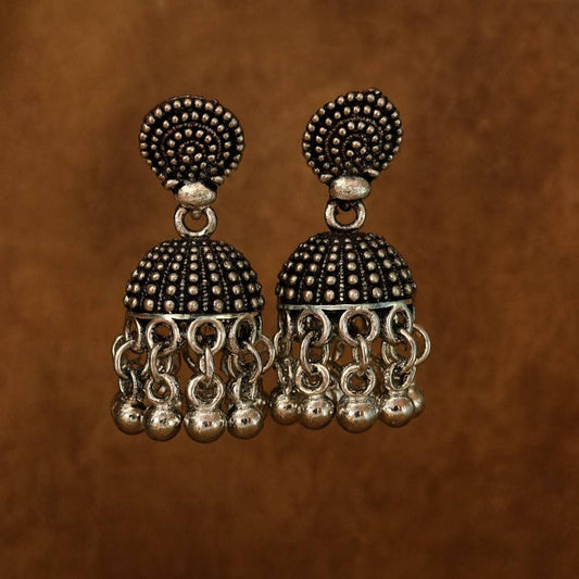 Oxidized silver-tone dome jhumka earrings with beaded detailing and dangling bells