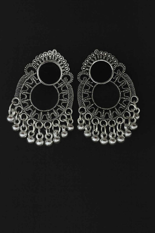 Oxidized silver-tone open hoop jhumka earrings with intricate design on black background