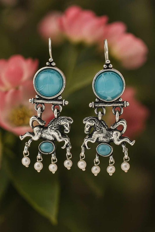 Turquoise blue horse design dangle earrings with pearls on floral background