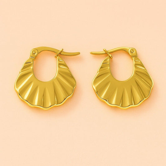 "Fan-shaped textured gold-tone hoop earrings – close-up view"