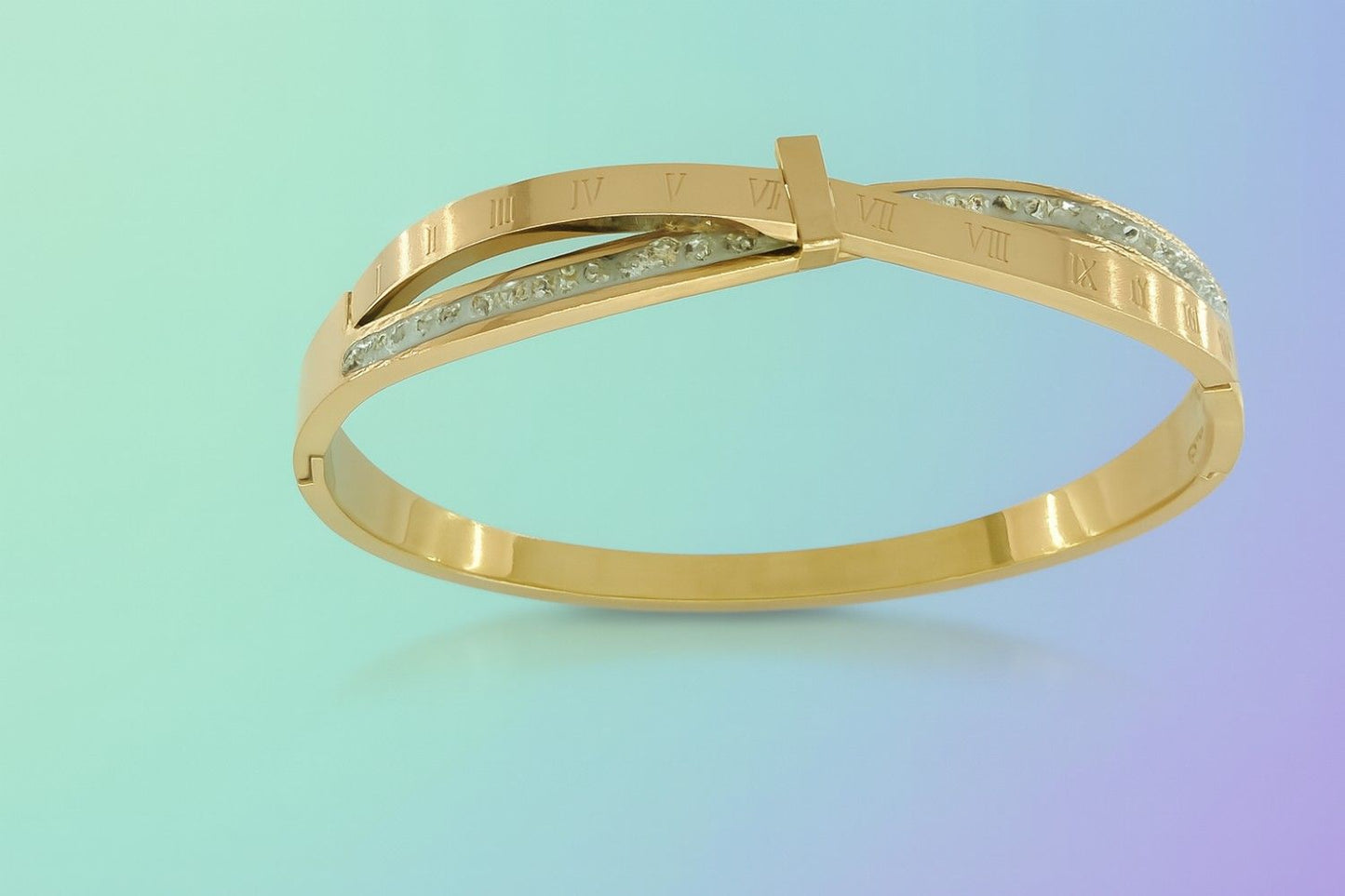 Gold-tone cuff bracelet with Roman numeral engraving and crystal detailing