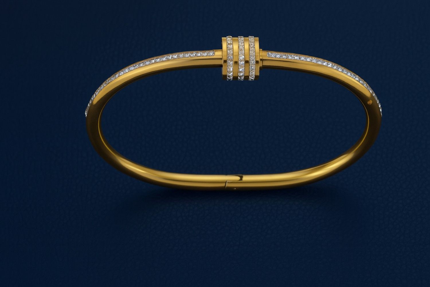Minimalist gold-colored bracelet with three-ring centerpiece