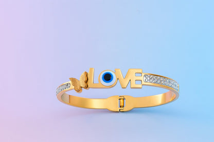 Love & butterfly gold-tone bracelet with evil eye and sparkling stones