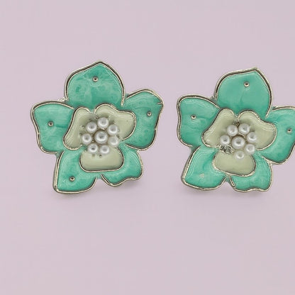 Mint green floral stud earrings with pearl detailingMint green floral stud earrings with pearl detailing