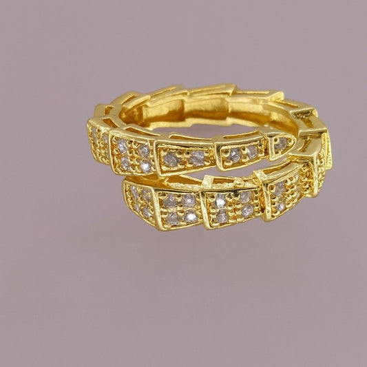 "Gold-tone double band ring with embedded sparkling crystals"