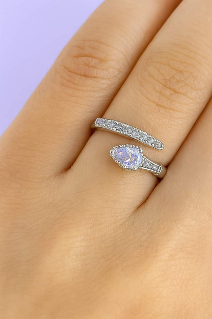 "Model wearing silver-tone teardrop crystal ring with adjustable fit"