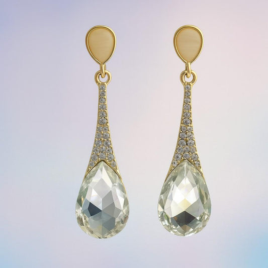Golden finish drop earrings with clear teardrop crystal and cubic zirconia accents – front view