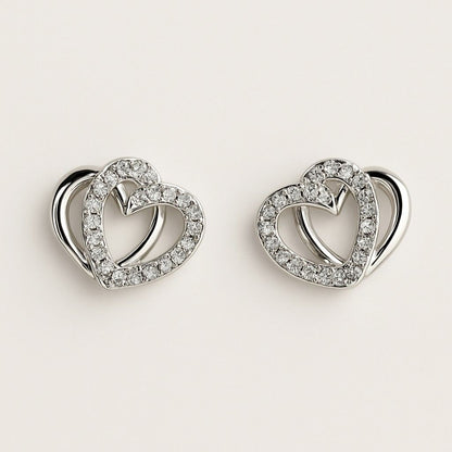 Silver-tone double heart stud earrings with crystal accents