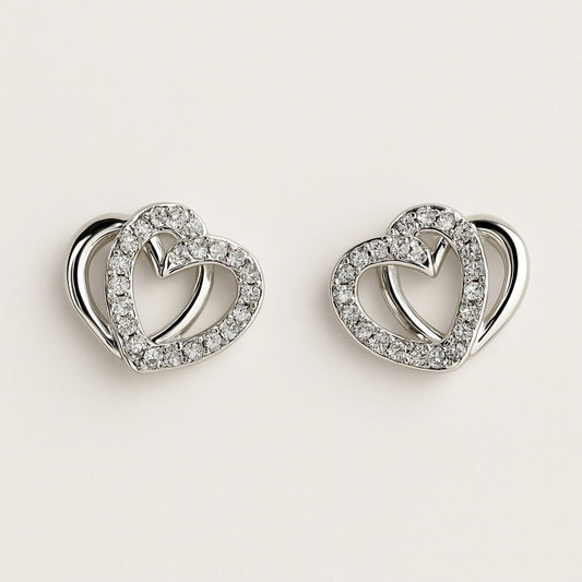 Silver-tone double heart stud earrings with crystal accents