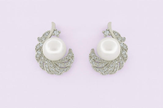 "Silver-tone feather pearl stud earrings with crystals"