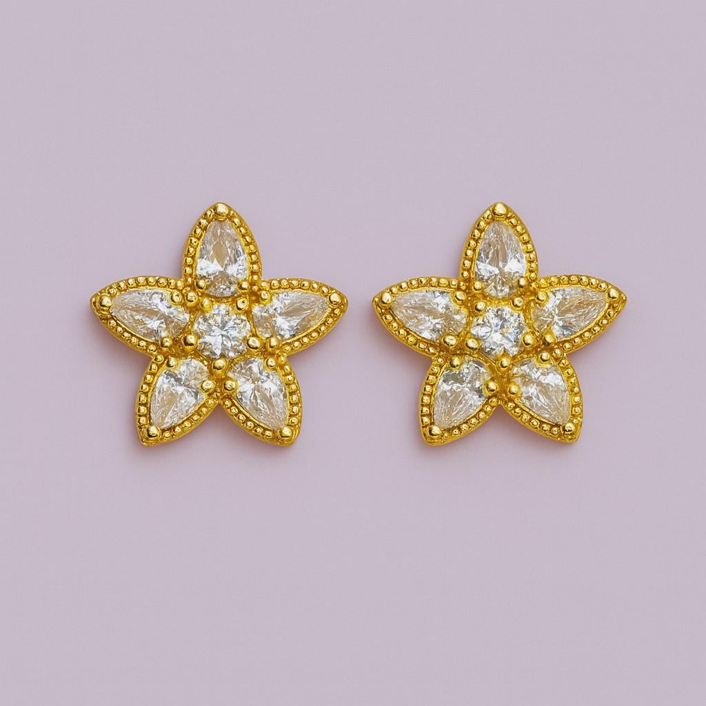 Golden flower stud earrings with clear crystal stones – front view