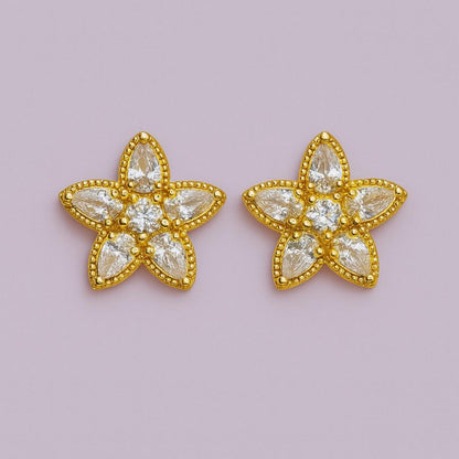 Golden flower stud earrings with clear crystal stones – front view