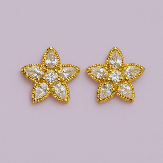 Golden flower stud earrings with clear crystal stones – front view