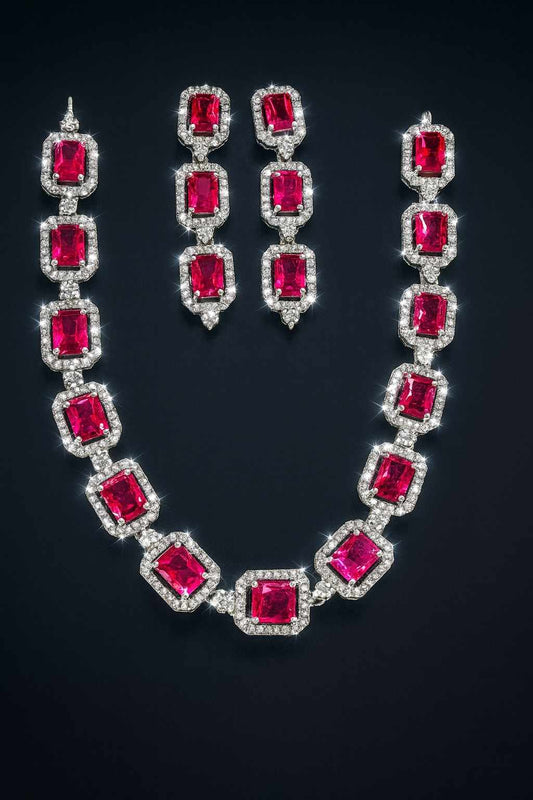 Red American Diamond necklace set with earrings in silver-tone finish on dark background