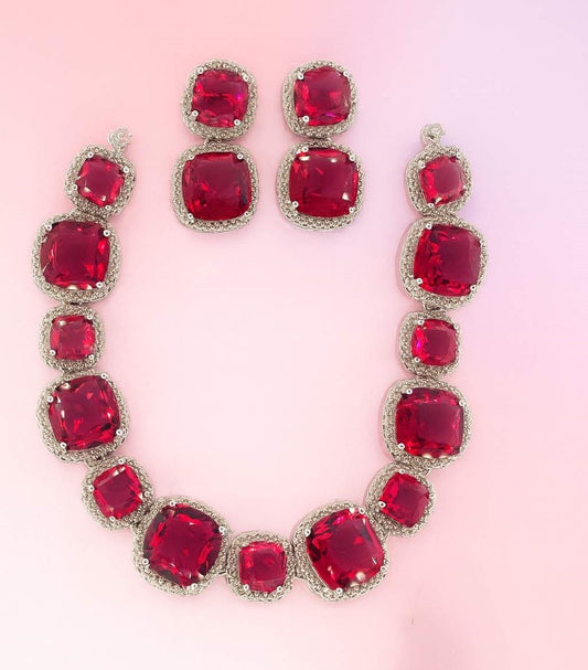 Elegant red AD stone necklace and earring set in silver-tone for party wear