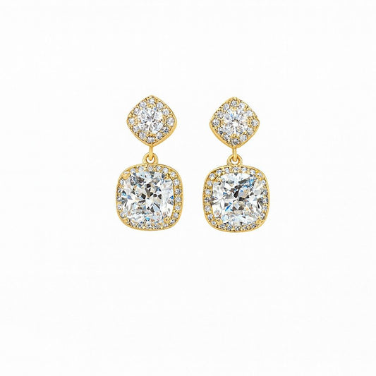 Pair of gold-tone cushion cut crystal drop earrings on white background