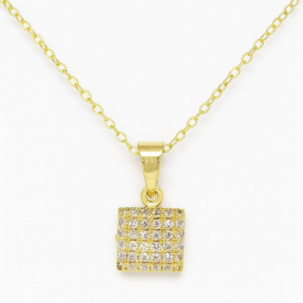 Gold-tone square crystal pendant necklace on white background