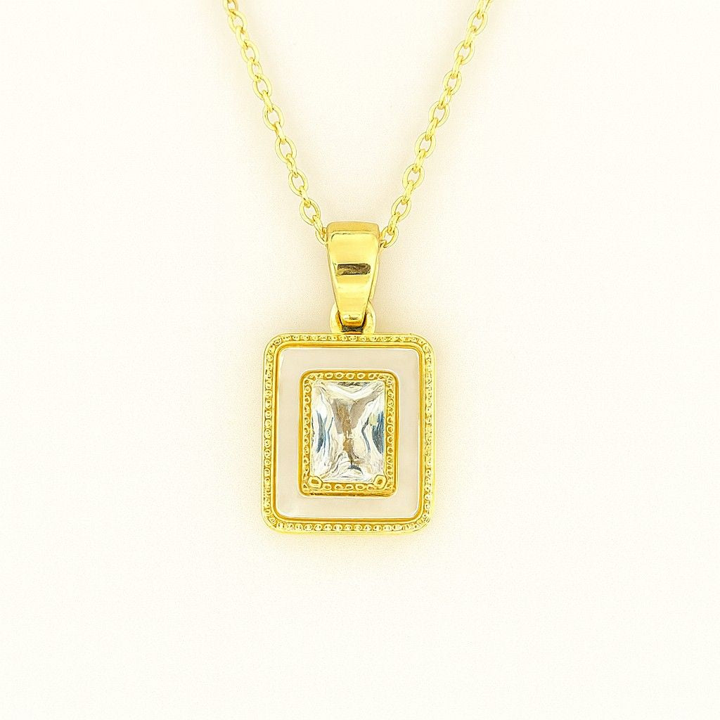 Gold-tone rectangular crystal pendant necklace with double frame design