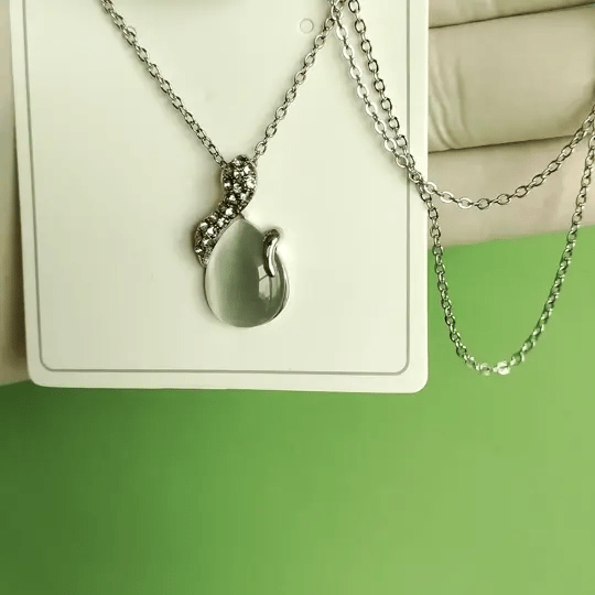 Elegant Silver-Tone Teardrop Stone Pendant Necklace | Crystal Swirl Design