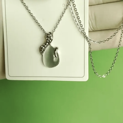 Elegant Silver-Tone Teardrop Stone Pendant Necklace | Crystal Swirl Design