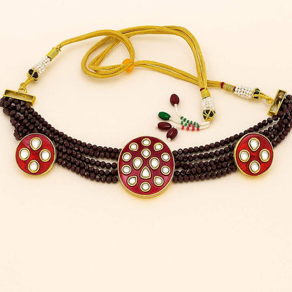 Royal red kundan choker necklace with multi-layer maroon beads and gold detailing