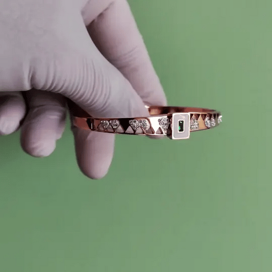 Gold-Tone Geometric Bracelet with Green Stone & Sparkling Accents