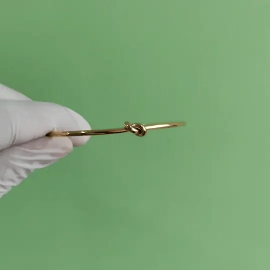 Gold-Tone Open Cuff Knot Bracelet – Minimalist & Elegant