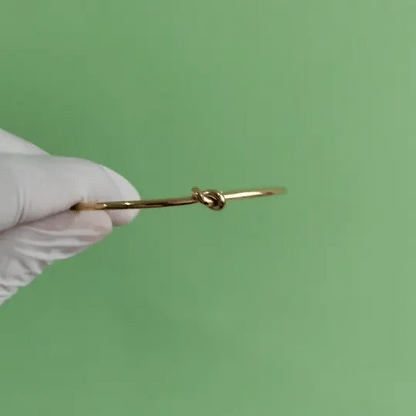 Gold-Tone Open Cuff Knot Bracelet – Minimalist & Elegant