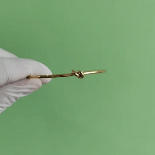 Gold-Tone Open Cuff Knot Bracelet – Minimalist & Elegant