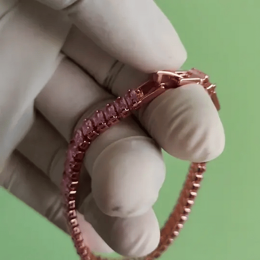 Elegant Pink Baguette Tennis Bracelet – Rose Gold-Tone Setting